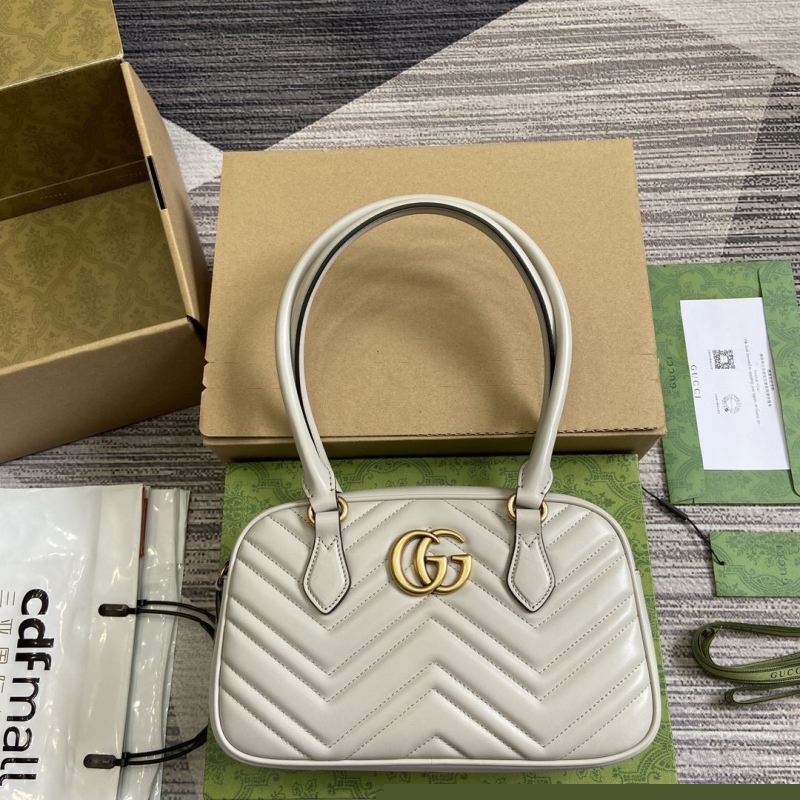 G*u*i top handle bags